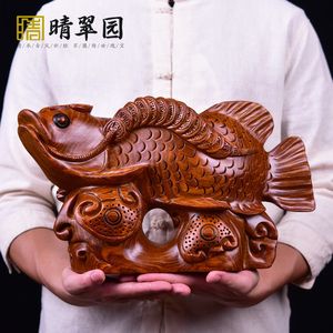 雕刻金龙鱼的寓意与象征意义：金龙鱼在不同的文化和语境中有不同的寓意和象征意义 龙鱼百科 第2张