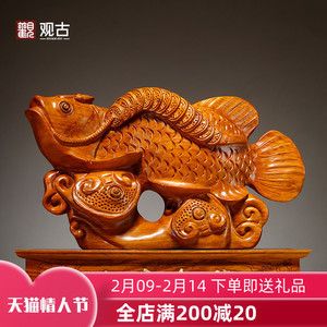 雕刻金龙鱼的寓意与象征意义：金龙鱼在不同的文化和语境中有不同的寓意和象征意义 龙鱼百科 第1张