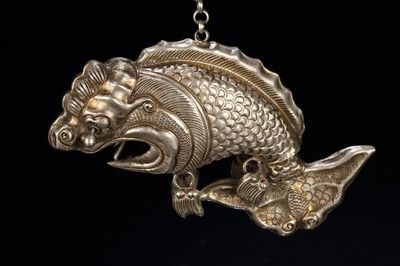 鱼龙用什么饲料好：鱼龙纹饰在中国传统文化中有着丰富的象征意义